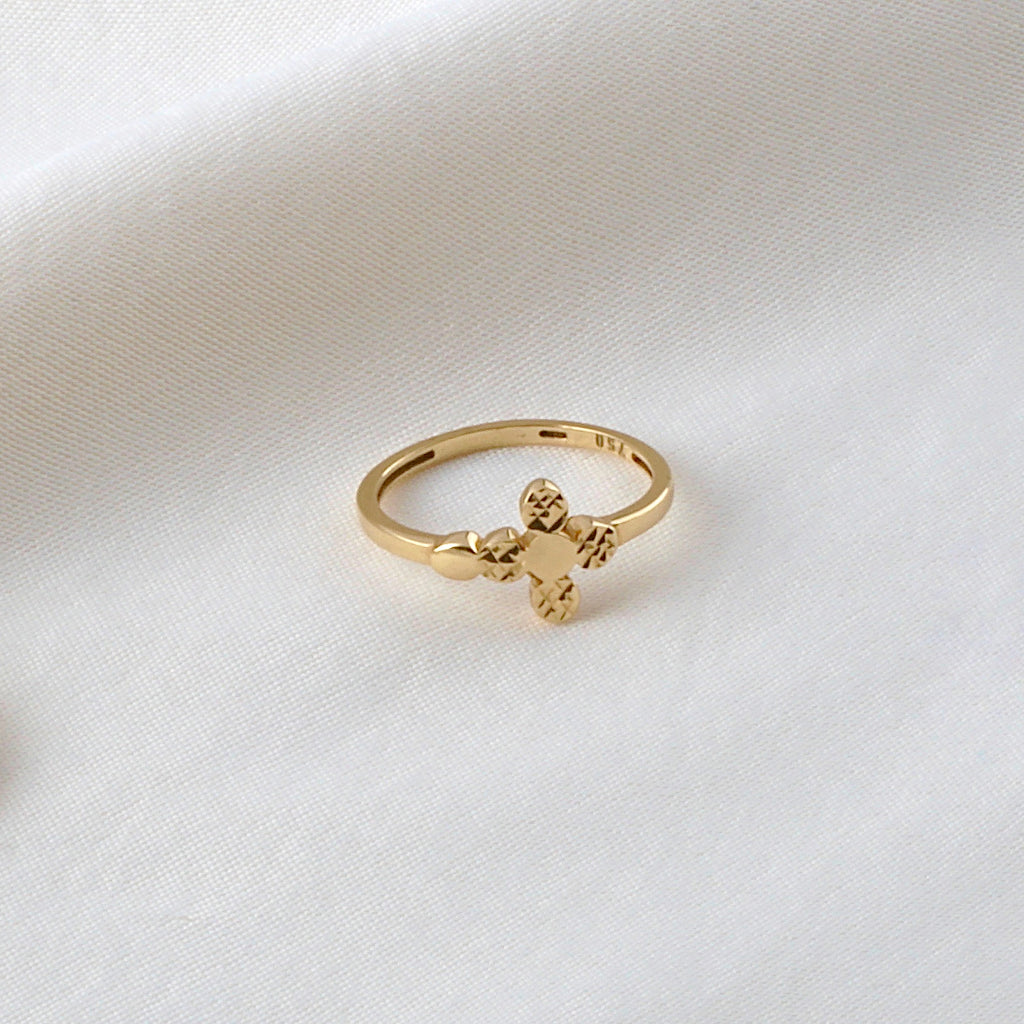 A beautiful gold Celtic inspired golden cross ring with intricate detailing and beautiful delicate poise.
